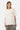T-shirt Joums Écru coupe ample porté par un mannequin femme, de face, poche poitrine brodée Eleven dorée