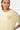 T-shirt Flaris Jaune coupe ample, gros plan de face sur mannequin femme, inscription l'amour beige en relief