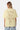 T-shirt Flaris Jaune vu de dos sur mannequin femme, grande inscription In the end l'amour beige en relief