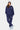 Jogging Foly Bleu Marine porté avec un sweat à capuche assorti par une mannequin femme, de face, inscription Elevenparis