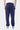 Jogging Foly Bleu Marine vu de trois quarts sur mannequin homme, inscription Elevenparis sur la cuisse, bas resserré