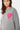 Pull col rond Edmo Gris, gros plan de face sur mannequin femme, cœur rose smiley en jacquard sur la poitrine