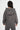 Sweat à capuche Ejack Gris porté de dos par une femme, fleurs de lys sur la capuche