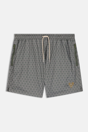 Maillot de bain Jamaique Kaki de face à plat, motif graphique vert, cordon écru, poches zippées et petit coeur doré