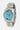 Montre Fito Turquoise vue de trois quarts, bracelet en acier à maillons et cadran turquoise paisley