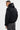 Blouson Eschott Noir vu de dos et de trois quarts sur mannequin homme, capuche ornée d'un cœur brodé