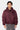 Blouson Eschott Bordeaux porté de face par un mannequin homme, écusson cœur brodé et manche zippée