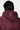 Blouson Eschott Bordeaux, zoom sur la capuche de dos, cœur rose brodé et inscription NYC