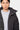 Doudoune Fabulous Noir, plan rapproché sur mannequin homme, col zippé à boutons pression et pull gris