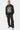 Sweat à capuche Fanta Noir porté en pied par un homme avec pantalon cargo noir délavé et baskets grises