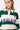 T-shirt polo rayé Feva Vert en gros plan sur une femme, col boutonné, lettrage ELVNPRS rose et petit cœur
