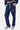 Jogging Fiby Bandana Bleu Marine porté par une femme, vue de face, cordons multicolores et broderie triangle à la cuisse