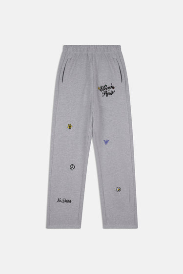 Jogging Filya Gris Chiné de face à plat, logo Eleven Paris brodé, petits motifs fleur, paix et papillon sur les jambes
