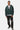 Sweat à capuche zippé Fizz Vert porté de face par un mannequin homme, pantalon noir à motifs trèfle, baskets