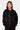 Sweat à capuche zippé Flarion Noir porté de face par une mannequin femme, flammes de strass sur le devant, mains en poches
