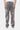 Pantalon Flex Gris porté de dos par un mannequin homme, deux poches plaquées, fleurs de lys roses et blanches