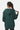 Sweat à capuche Flocon Vert porté de dos par une mannequin femme, capuche à bordure surpiquée blanche, uni