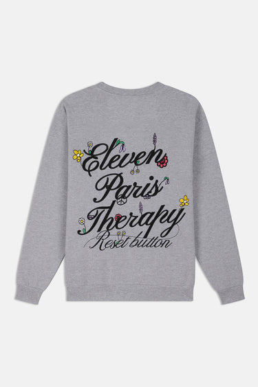 Sweat col rond Flora Gris Chiné de dos à plat, grande broderie cursive Eleven Paris Therapy Reset button et petites fleurs