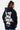 Sweat à capuche Florian Noir porté de dos par une mannequin, grande inscription blanche In the end l'amour win