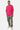T-shirt Floride Rose porté de face par un mannequin homme, coupe oversize, pantalon camouflage et baskets roses