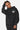 Sweat à capuche Focaccia Noir Délavé porté par une femme, de face, coeur brodé turquoise sur la poitrine, poche kangourou