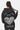 Sweat à capuche Focaccia Noir Délavé porté par une femme, de dos, grand coeur et texte Love Aways Find Its Way