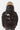 Doudoune enfant Flash Noir brillante portée de dos, capuche et matelassage horizontal
