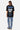 T-shirt Jais Noir vu de dos sur une mannequin femme, cœur Eleven Paris bleu, jean bleu à croix