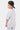 T-shirt enfant Jalisco Gris Chiné vu de dos sur un garçon avec casquette noire et short assorti