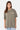 T-shirt Jamaica Kaki porté de face par une mannequin femme, inscription Elevenparis jaune pâle et jean à fleur de lys