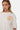 T-shirt Jaris Écru en gros plan sur une mannequin femme, inscription I Only Love You in Paris orange et rose