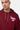 Sweat à capuche Javalentin Bordeaux, gros plan sur un mannequin homme, cordons rayés et inscription rose l'amour win
