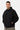 Veste à capuche zippée Jaway Noir portée par un mannequin homme, de face, main dans la poche, coeur brodé