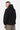 Veste à capuche Jaway Noir portée par un mannequin homme, vue de dos, empiècement dorsal et bas élastiqué