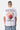 T-shirt Jegg Blanc porté par un mannequin homme, vue de dos, coeur oeuf au plat à croix et inscription Eleven