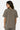 T-shirt Jerusalema Kaki porté par une mannequin femme, vue de dos, coupe ample et col rond