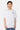 T-shirt Jerusalema Gris Chiné porté par un mannequin homme, de face, coeur gris brodé sur la poitrine, jean bleu