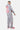 Sweat à capuche Evy Gris Chiné porté de dos par un mannequin homme, grand cœur blanc et inscriptions rouges Love