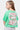 T-shirt Jilona Vert porté par une fille, vue de dos, grand cœur blanc à croix et inscriptions Love Amor roses