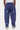 Jogging Joachim Bleu Marine délavé porté par un enfant, vue de dos, fleurs de lys bleu clair sur les jambes
