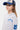 Sweat à capuche Joseph Gris Chiné en gros plan sur une fille, inscription bleue Eleven Paris en arc, casquette