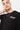 T-shirt Joy Noir porté par un mannequin homme, gros plan face avec inscription Parisian Tour No Snitch sur la poitrine