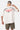 T-shirt Joy Écru porté de dos par un mannequin homme avec short cargo kaki, Eleven Paris gothique et Parisian Tour No Snitch
