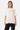 T-shirt Joy Écru porté de face par une mannequin femme, inscription rouge Parisian Tour No Snitch sur la poitrine
