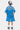 T-shirt Jude Bleu porté de dos par un enfant avec casquette, grand lettrage ELVNPRS autour d'un cœur, short bleu