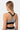 Brassière de sport Judoka Zèbre portée de dos, bretelles noires croisées avec boucles métalliques, motif zèbre