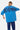 T-shirt Juno Bleu oversize porté de dos par une mannequin, grand lettrage Eleven bleu marine, pantalon cachemire