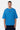 T-shirt Juno Bleu oversize porté de face par un mannequin homme, petit logo Eleven au centre, pantalon cargo bleu marine