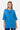 T-shirt Juno Bleu oversize porté de face par une mannequin femme, petit logo Eleven bleu marine sur la poitrine