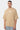 T-shirt Juno Beige oversize porté de face par un mannequin homme avec chaîne, petit logo Eleven blanc, jean clair